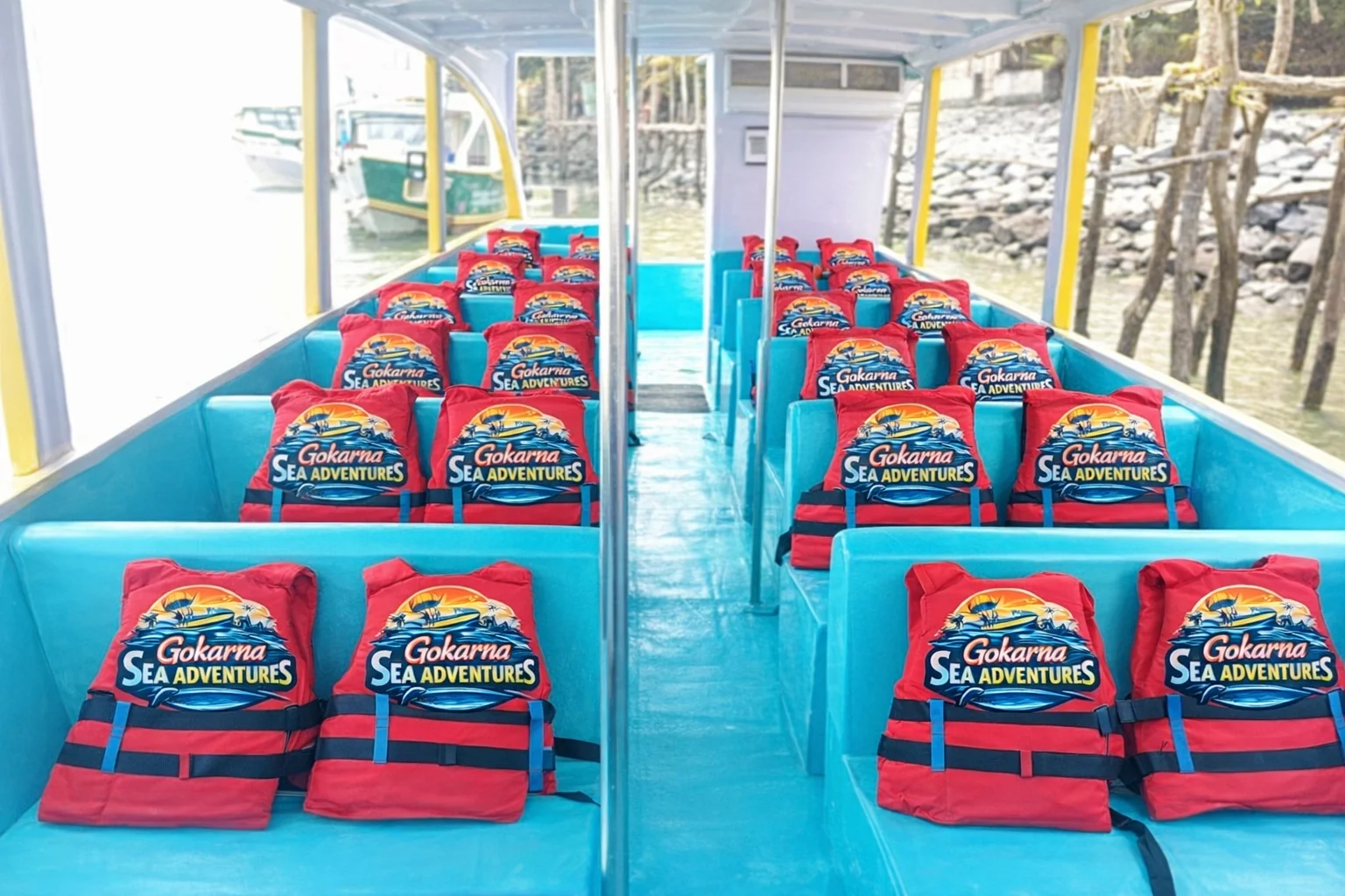 Safety life jackets and equipment provided for all passengers Safety life jackets and gears for boat ride in Gokarna